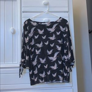 3/4 sleeve shirt with slit in the arms